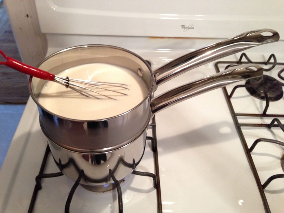 Place the top boiler over the simmering water and stir occasionally, scraping the bottom and sides with the whisk or a heat-proof spatula.