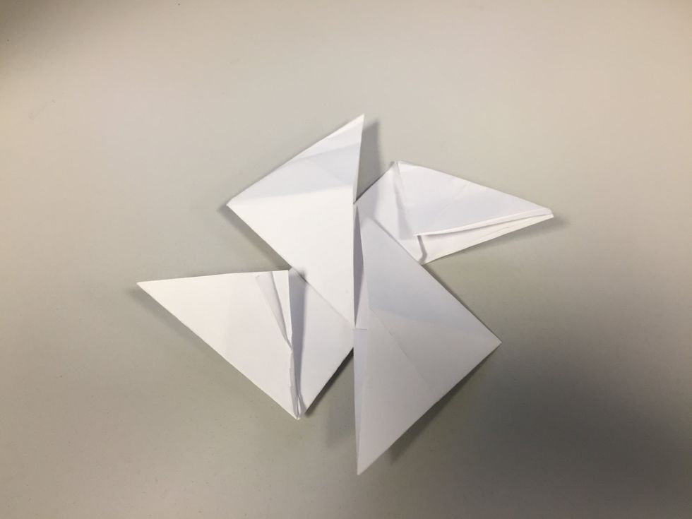 place the two papers on top of each other