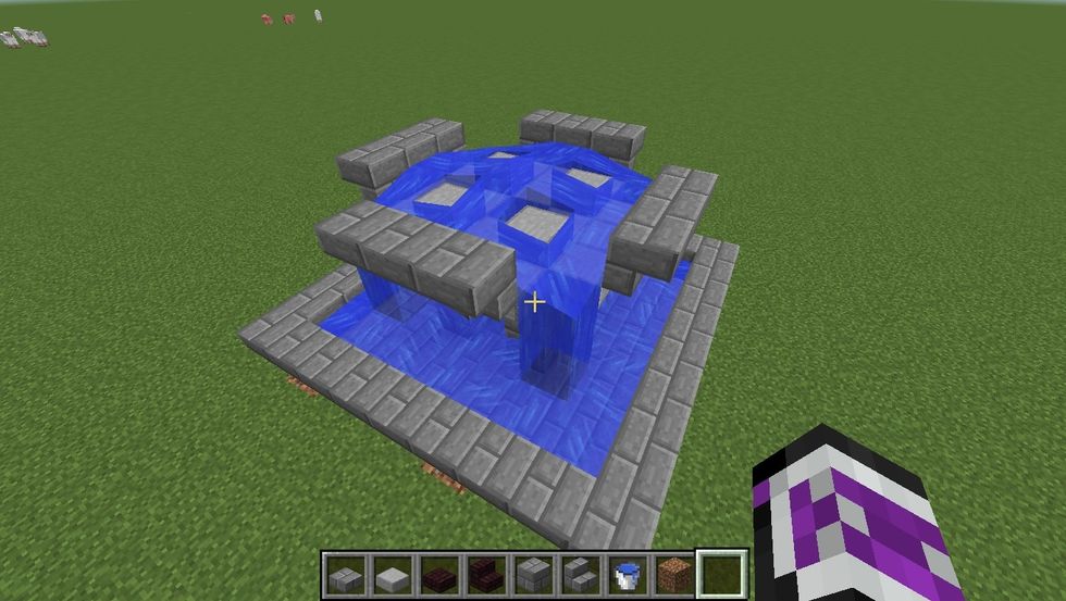 Place the water on the center Dirt block, then remove the dirt.