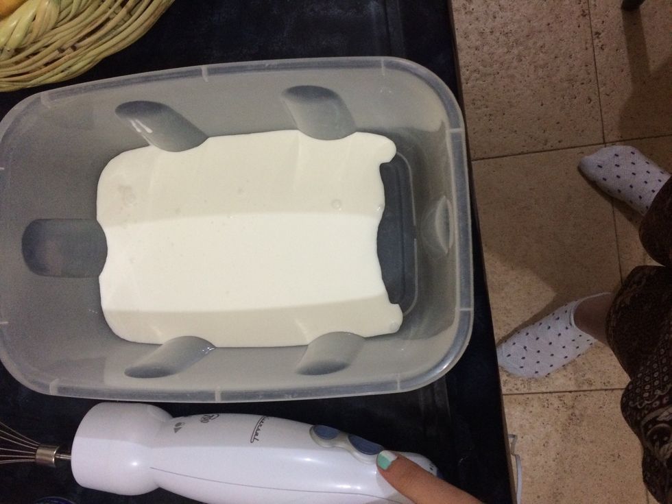 Place the whipped cream in a container