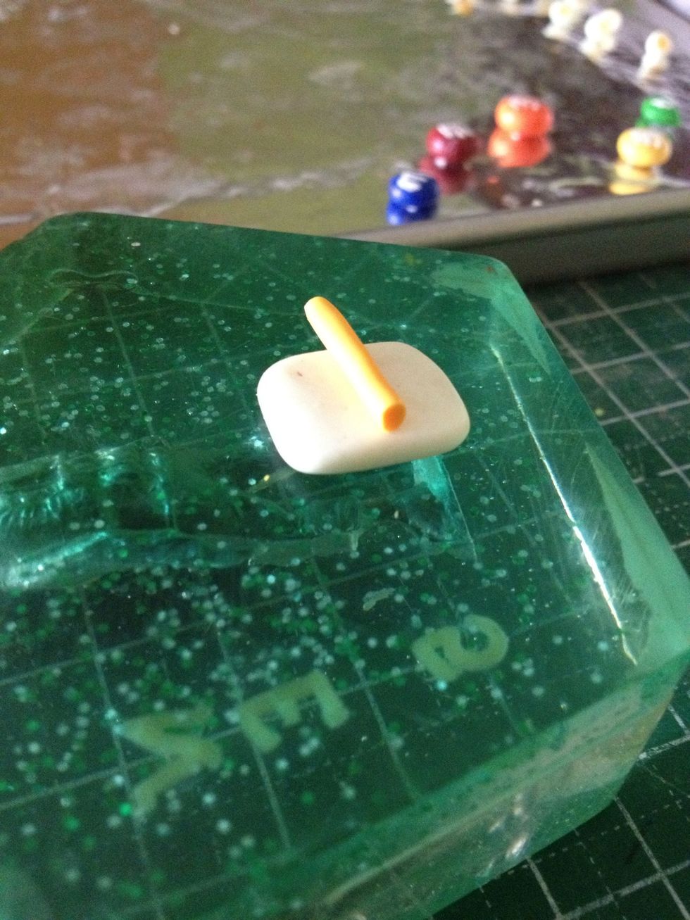 Place the yellow on top of the white slab.