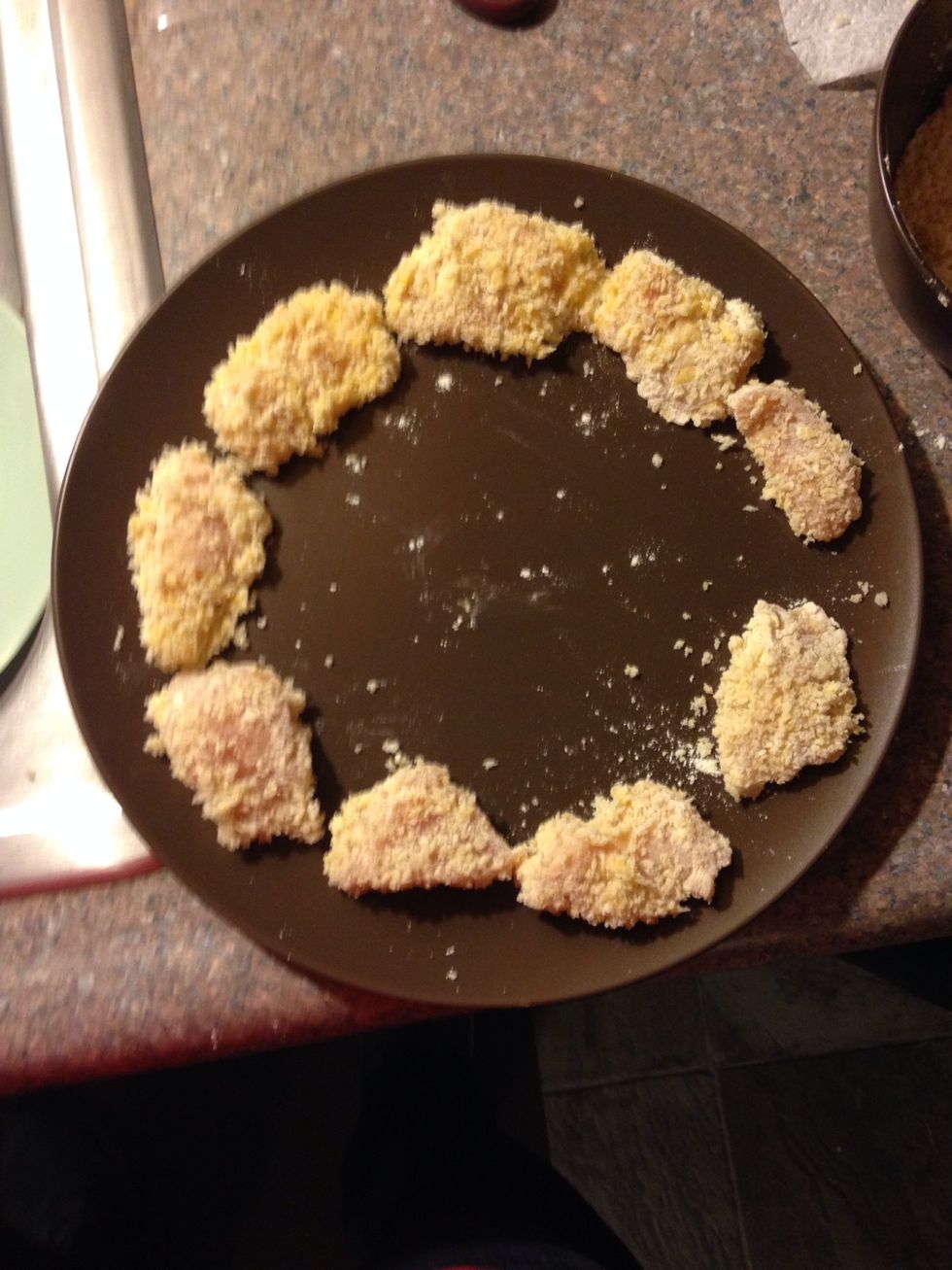 Place them on a plate to the side until you coat them all in breading