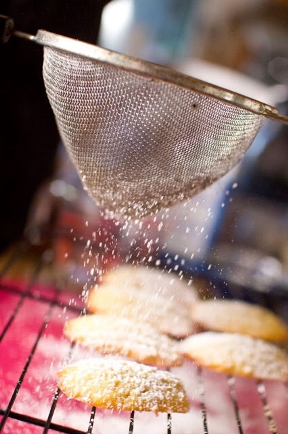 Place them on a wire cooling rack and let them chill for about 10 minutes, then sprinkle them with the powdered sugar.