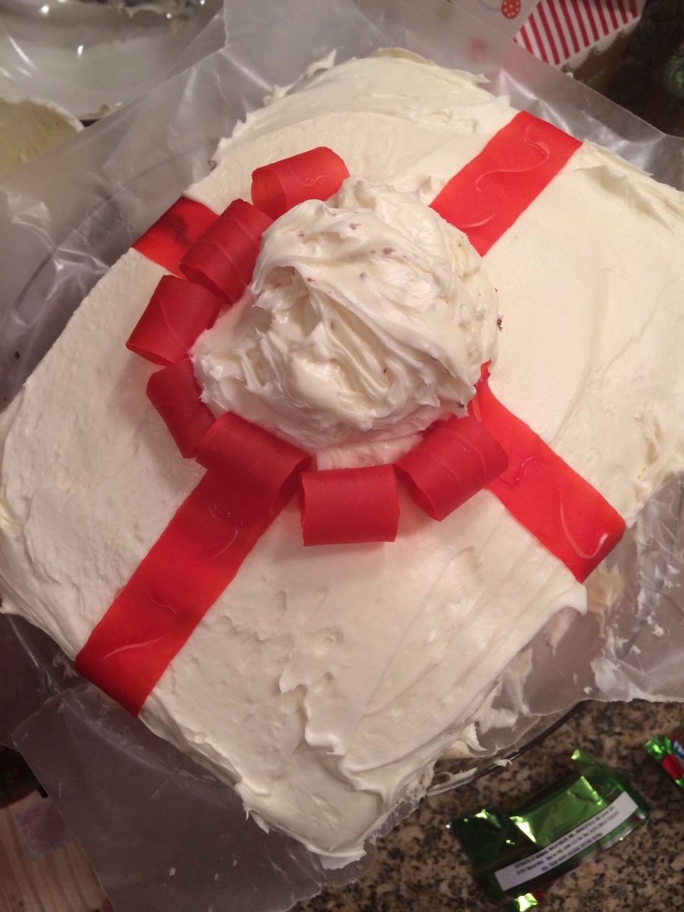 Place them onto the middle dollop. Pull out wax paper sheets from the bottom.