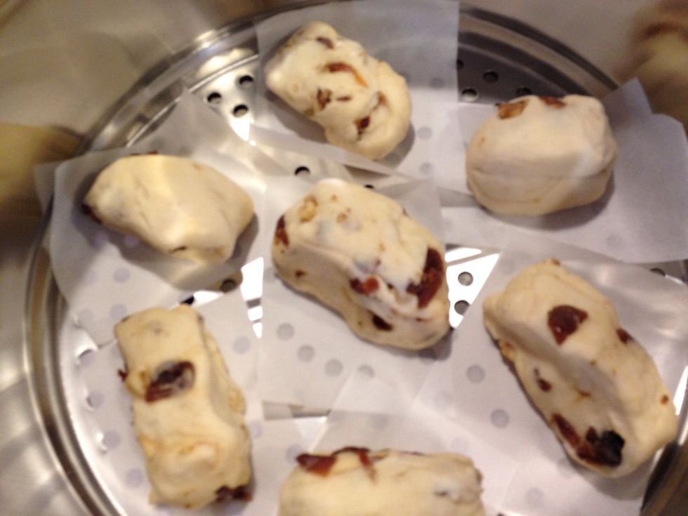 Place them to a large steam tray. Make sure you leave spaces in between because the will expand in the steamer