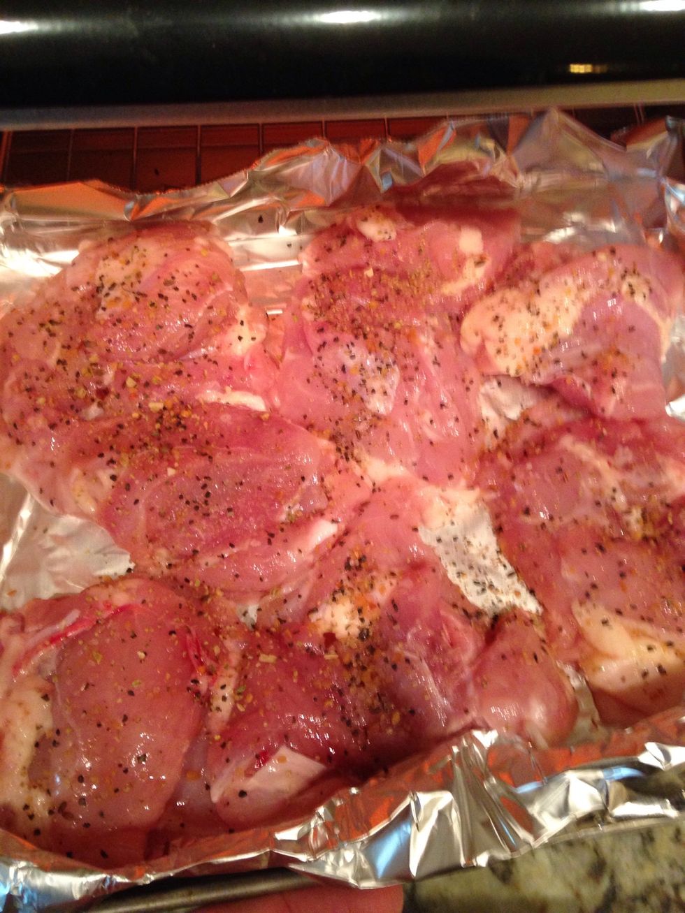 Place thin pieces of chicken, Breasts or thighs, onto the tinfoil