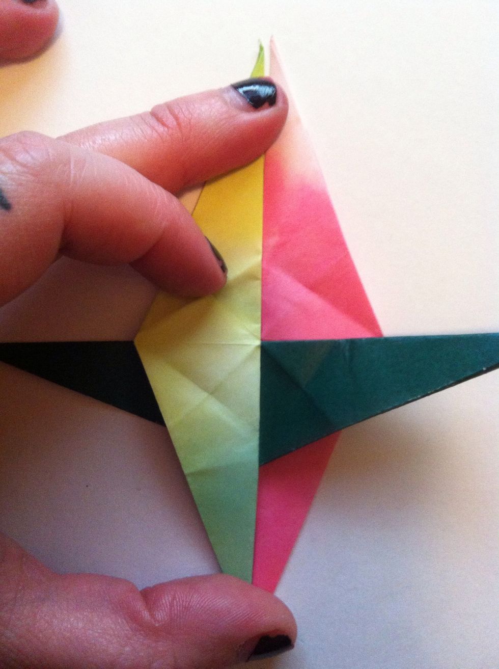 Place third one as shown (over pink; under green).