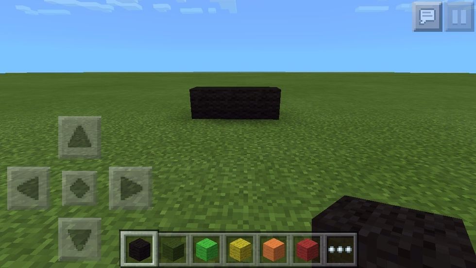 Place three blocks of black wool.