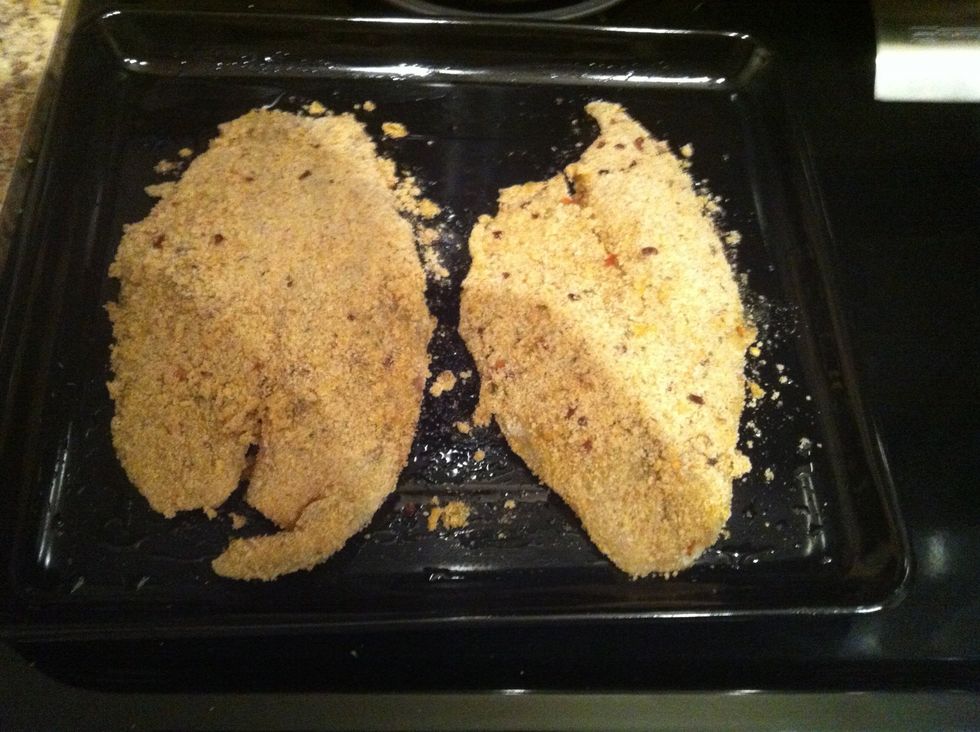 Place tilapia in egg and then transfer to bread crumb mixture. Finally, place in bake sheet and bake in oven at 325 for 12-15 minutes.