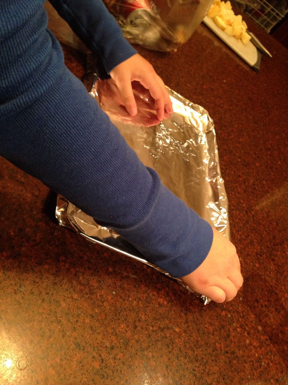 place tin foil on a tray