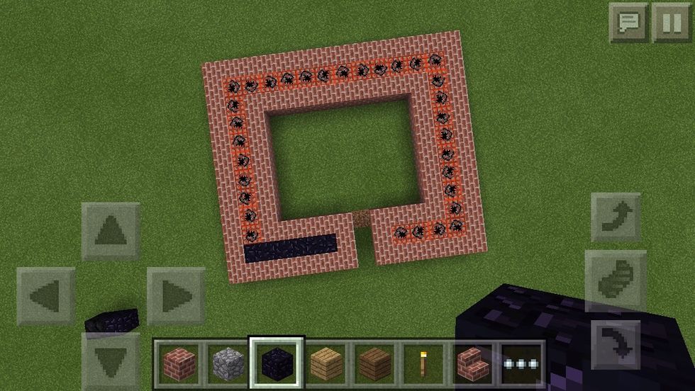 Place TNT in the space between the walls. Make sure to put obsidian in one wall so you can sell the story.