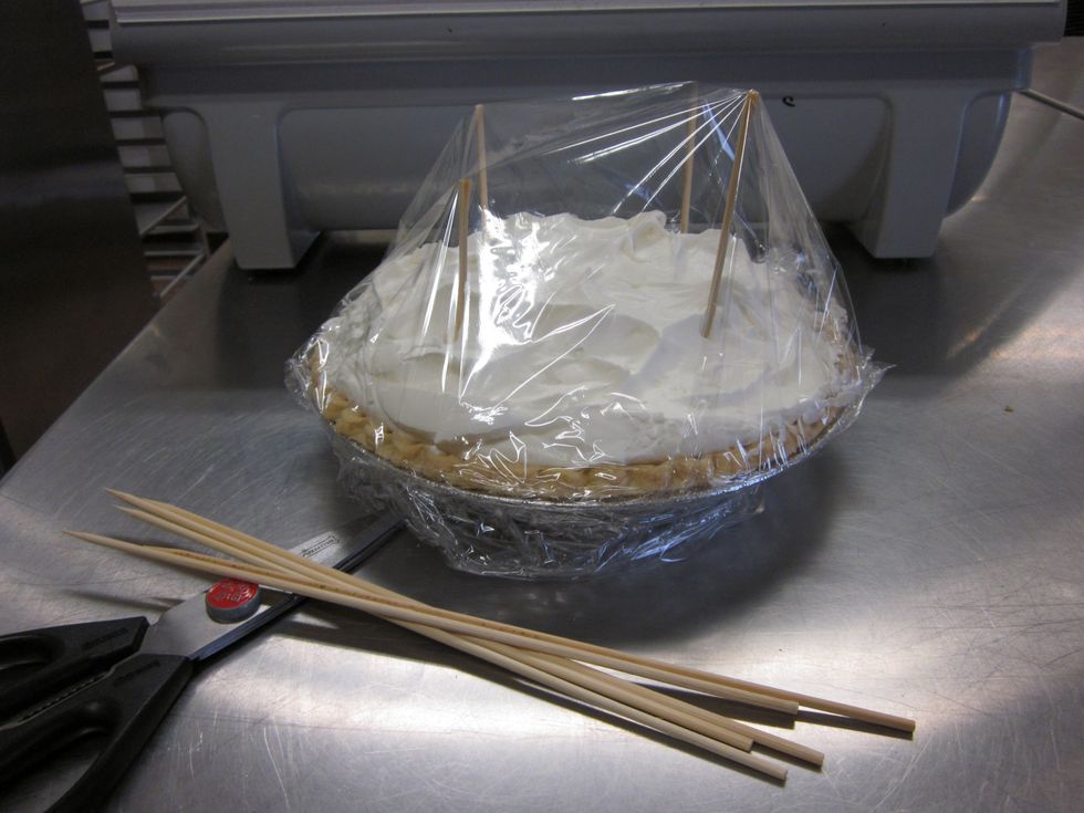 place tooth pics where your going to cut the pie then wrap in plastic wrap put in fridge till you eat it
