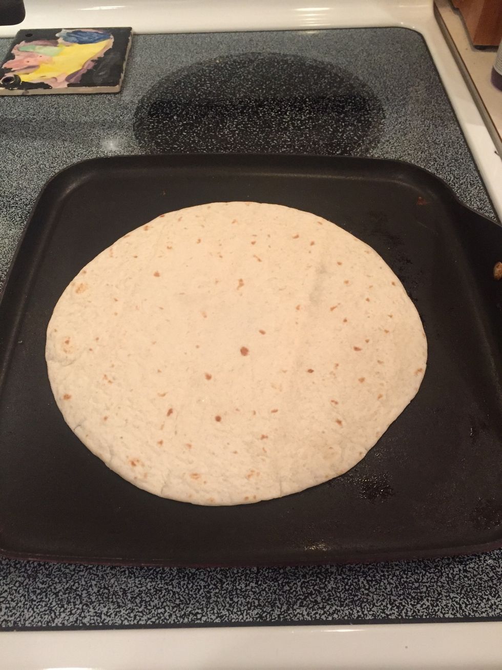 Place tortilla, oil side down, in an unheated pan.