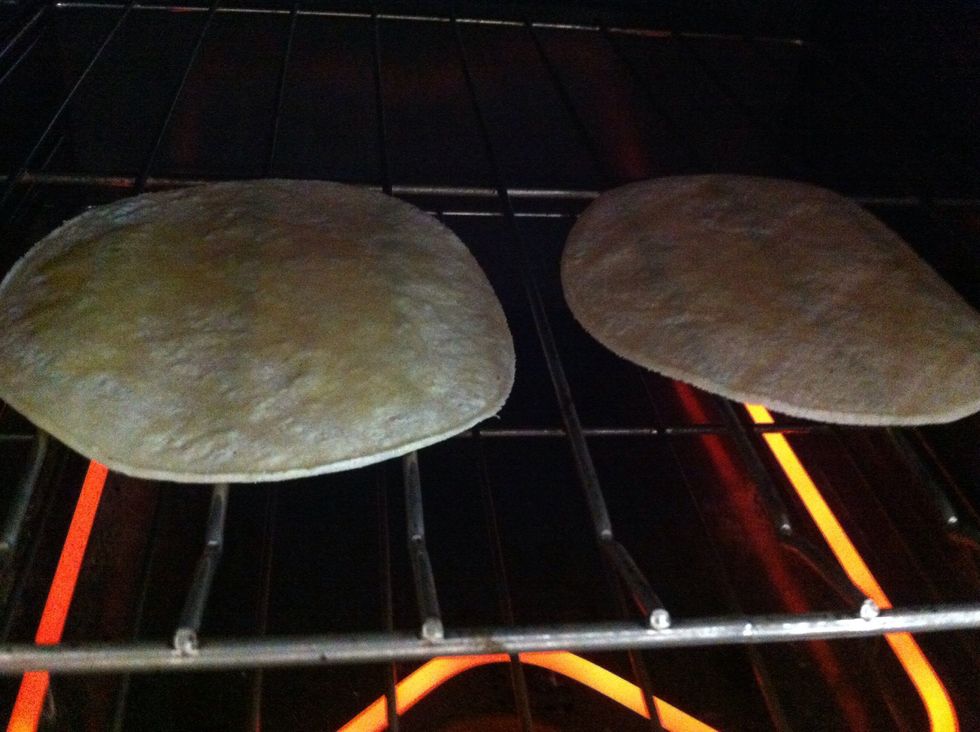 Place tortillas in pre-heated oven, oiled side up
