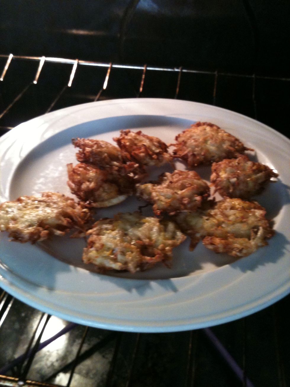 Place tots on a oven proof dish and pop into a warmed oven. (I set it to 250F for 10 minutes then turned off). Continue to fry tots and drain until no potato batter remans.