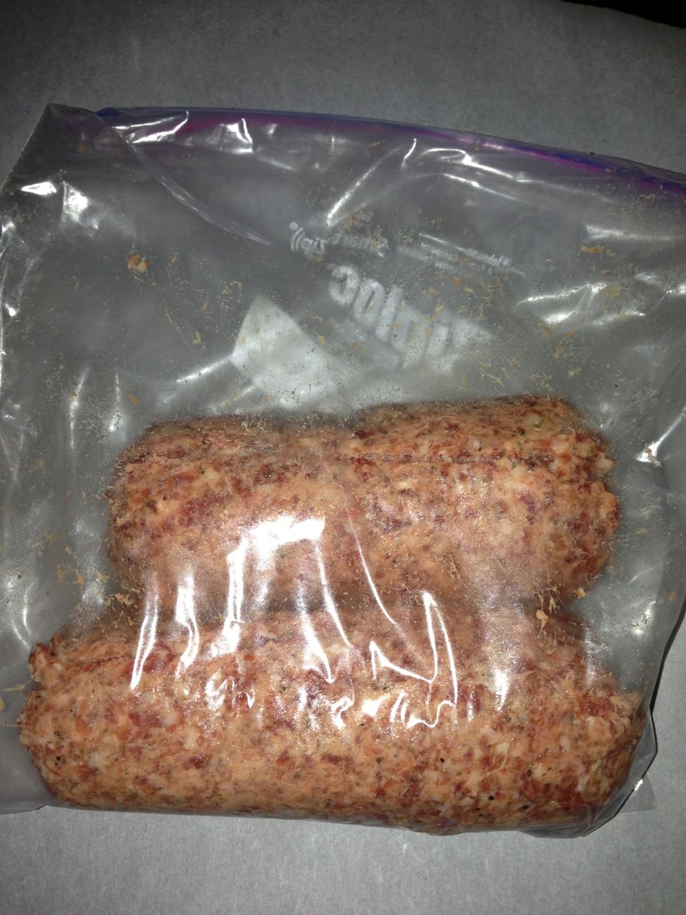 Place two pounds of sausage into a gallon ziplock bag.  For this recipe I have one pound each of breakfast and sage sausage.  You can use whatever your preference is.