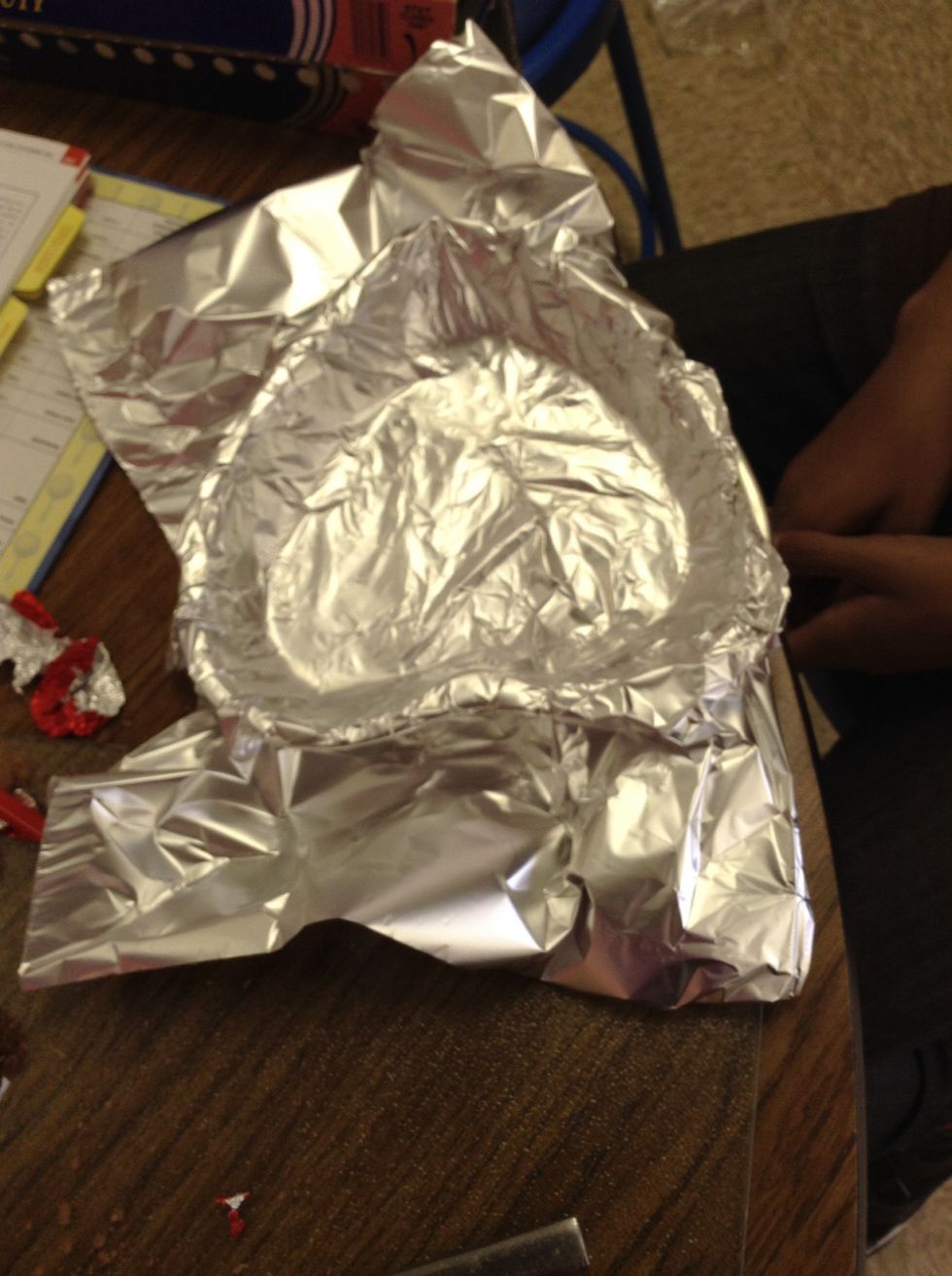 Place two sheets of aluminum foil on the baking sheet