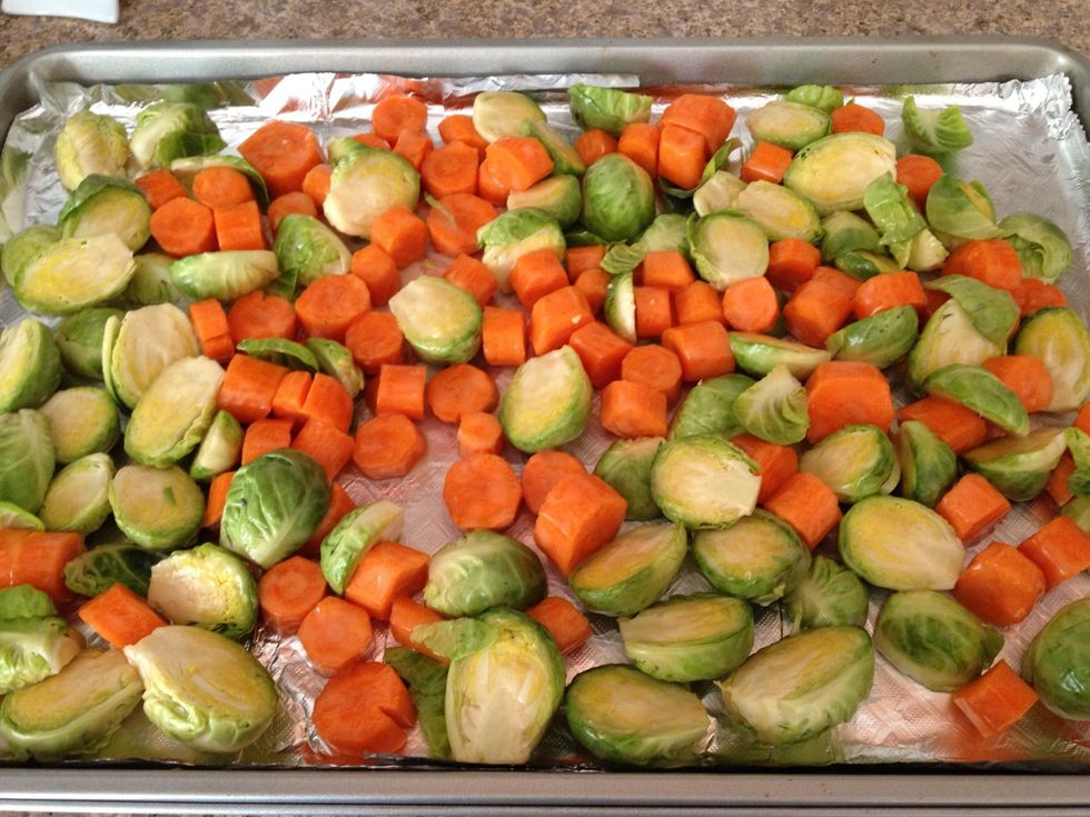 Place vegetables evenly onto a large baking sheet (lined with foil or parchment paper).