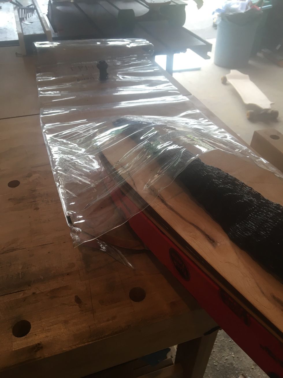 Place veneers in vacuum bag.