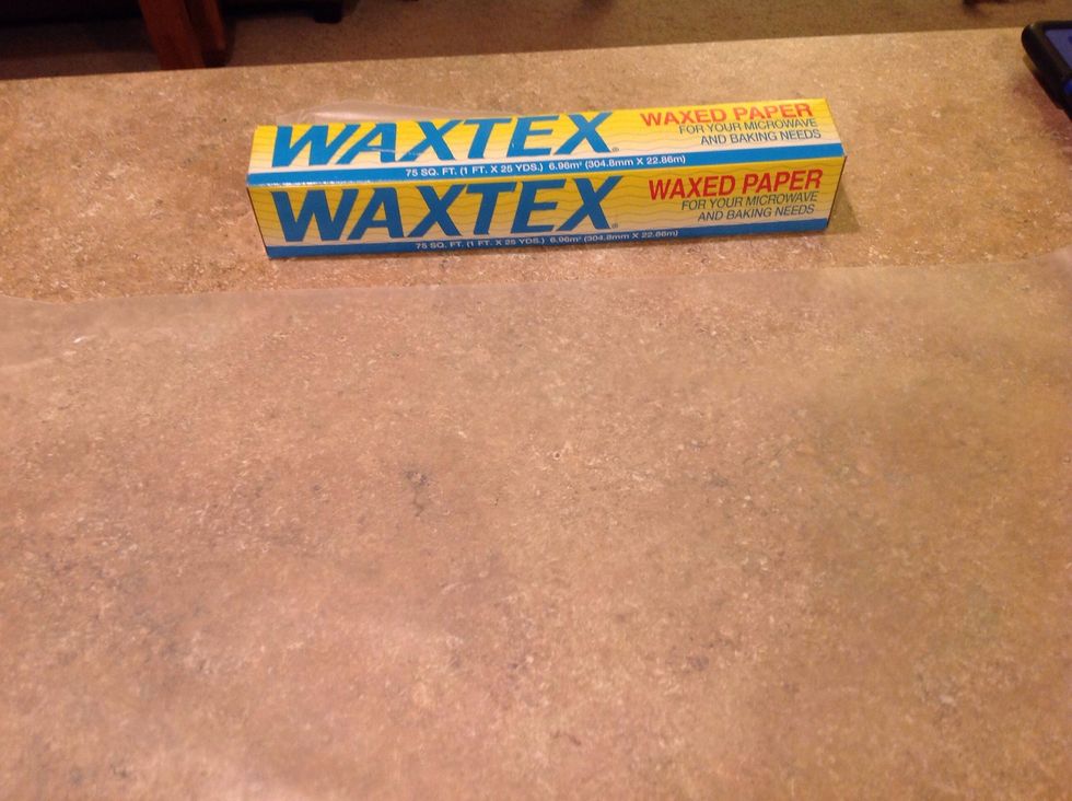 Place waxed paper on counter.