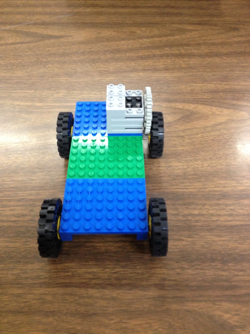 Place wheels on axles.