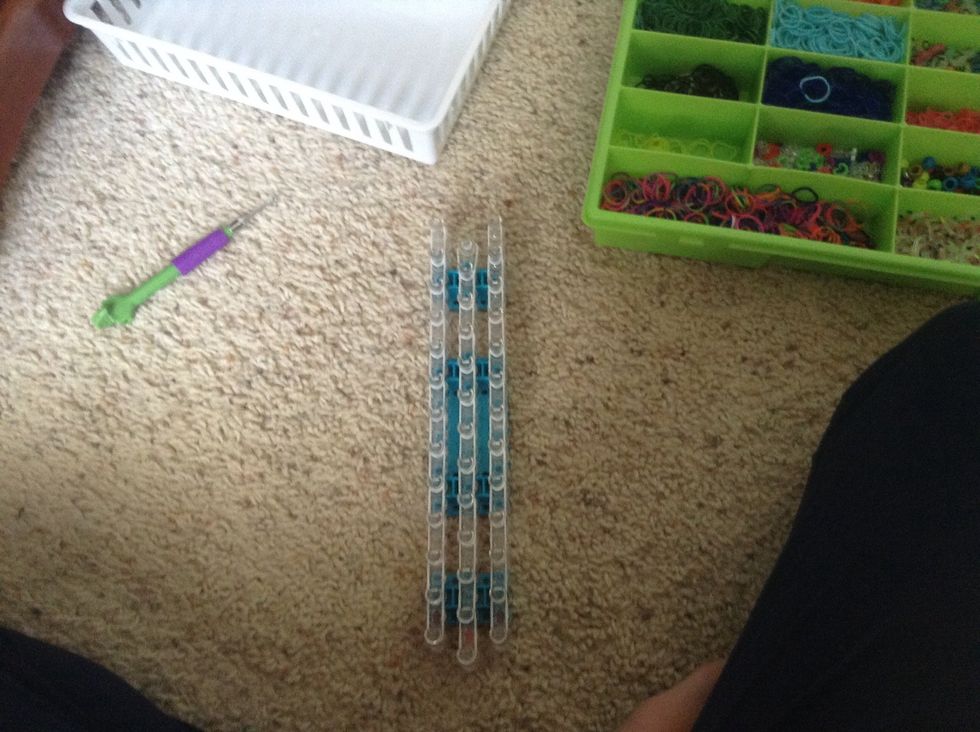 place white bands from red down to the bottom of your loom