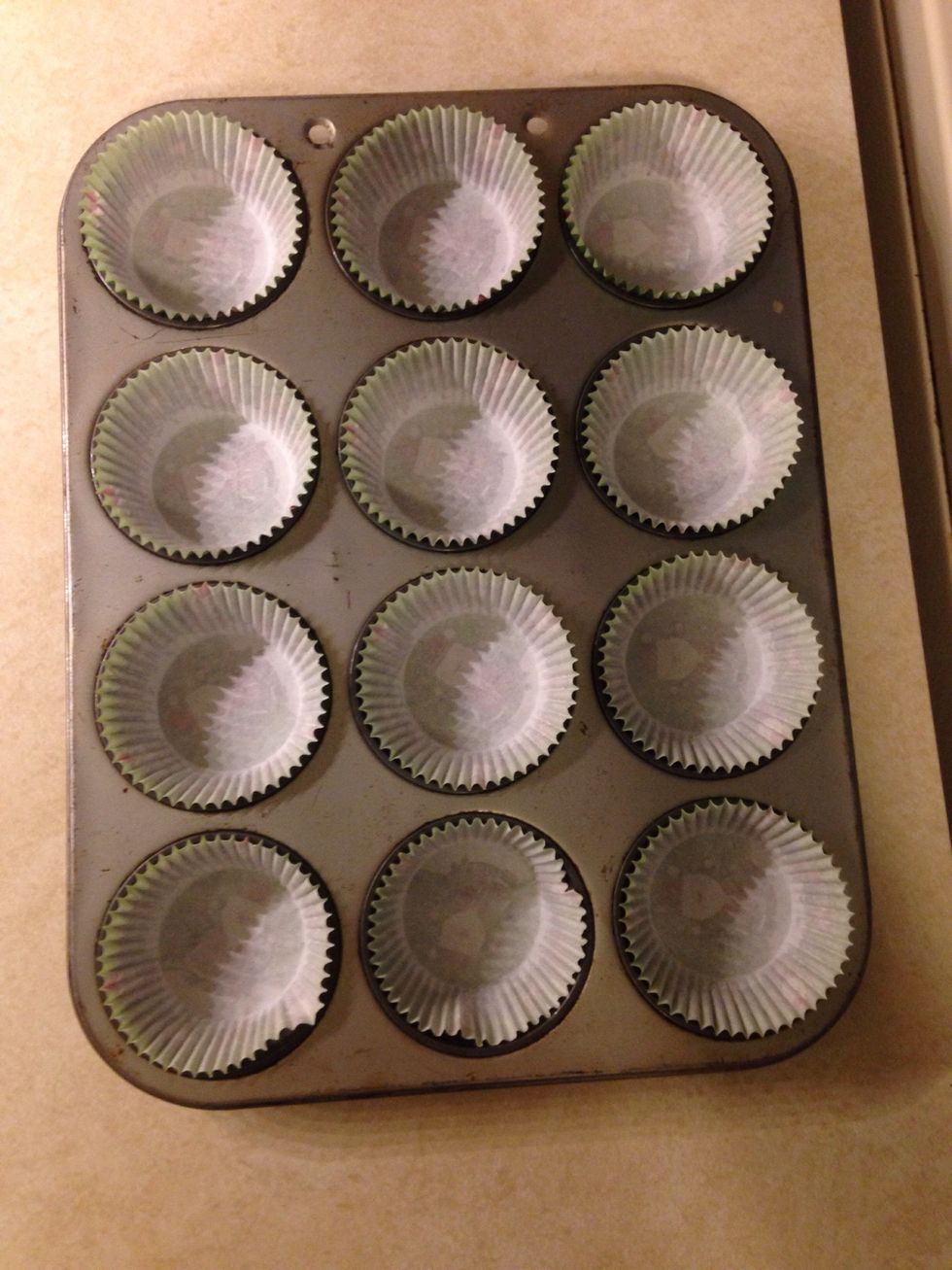 Place wrappers in tin