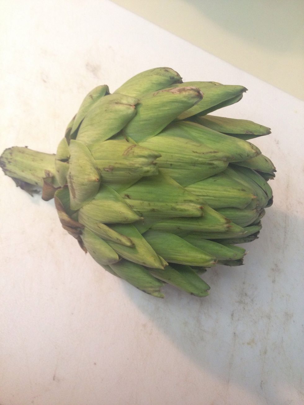 Place you artichokes on a cutting board.