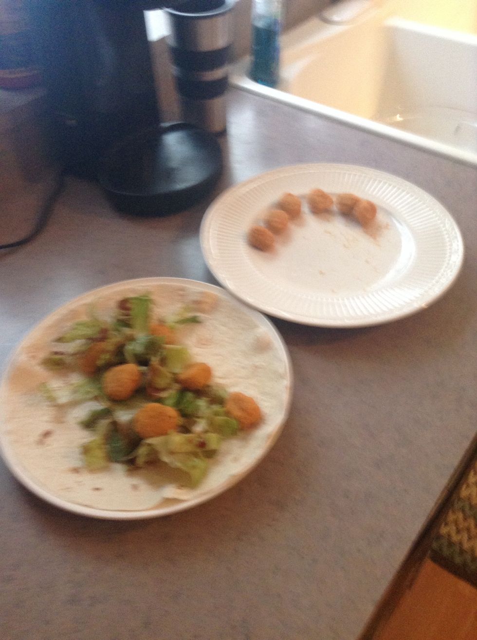 Place you chicken on the lettuce and add shredded cheese