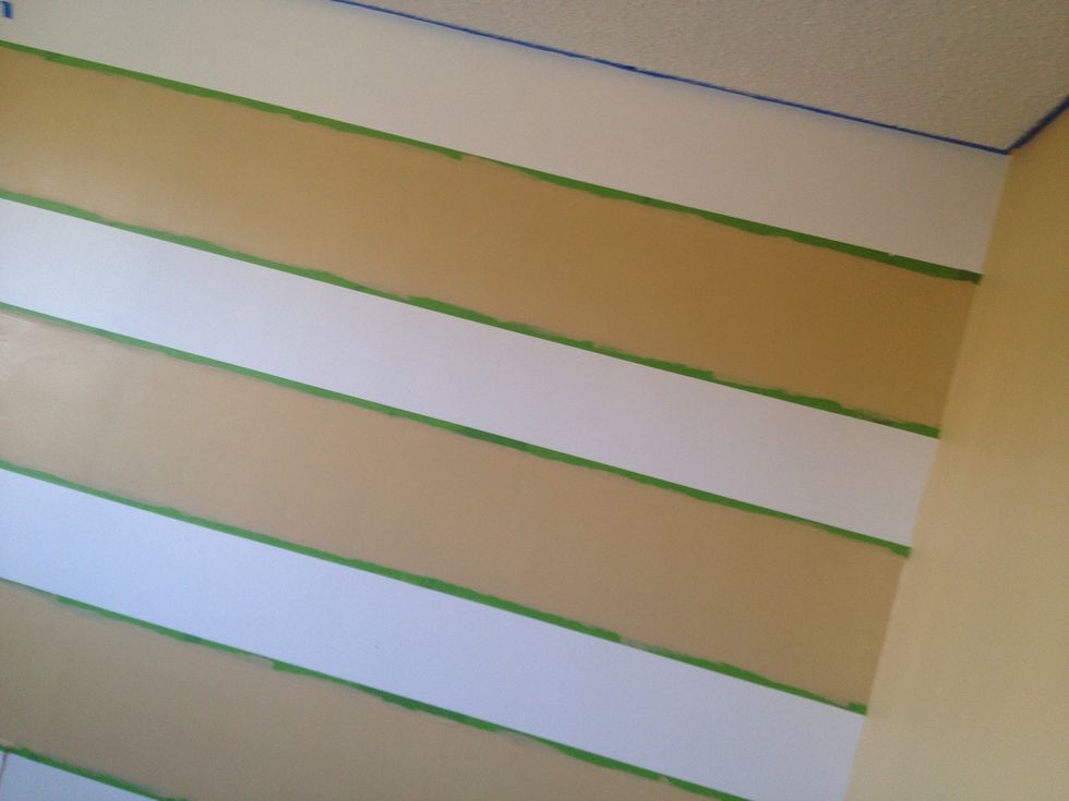 Place you tape on the inner line of your lighter base color. Fill in the larger sections with your darker shade. You may need to do 2 coats. Use Frog tape because it creates a crisp clean line.