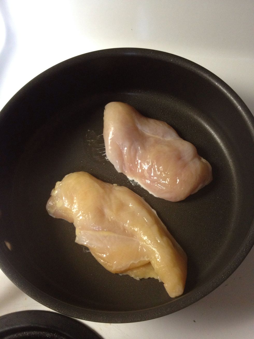 Place your chicken on medium heat. Cook each side for about 5-8 minutes till juices run clear. You can add some water in the pan to make your chicken even more juicy. I normally don't.