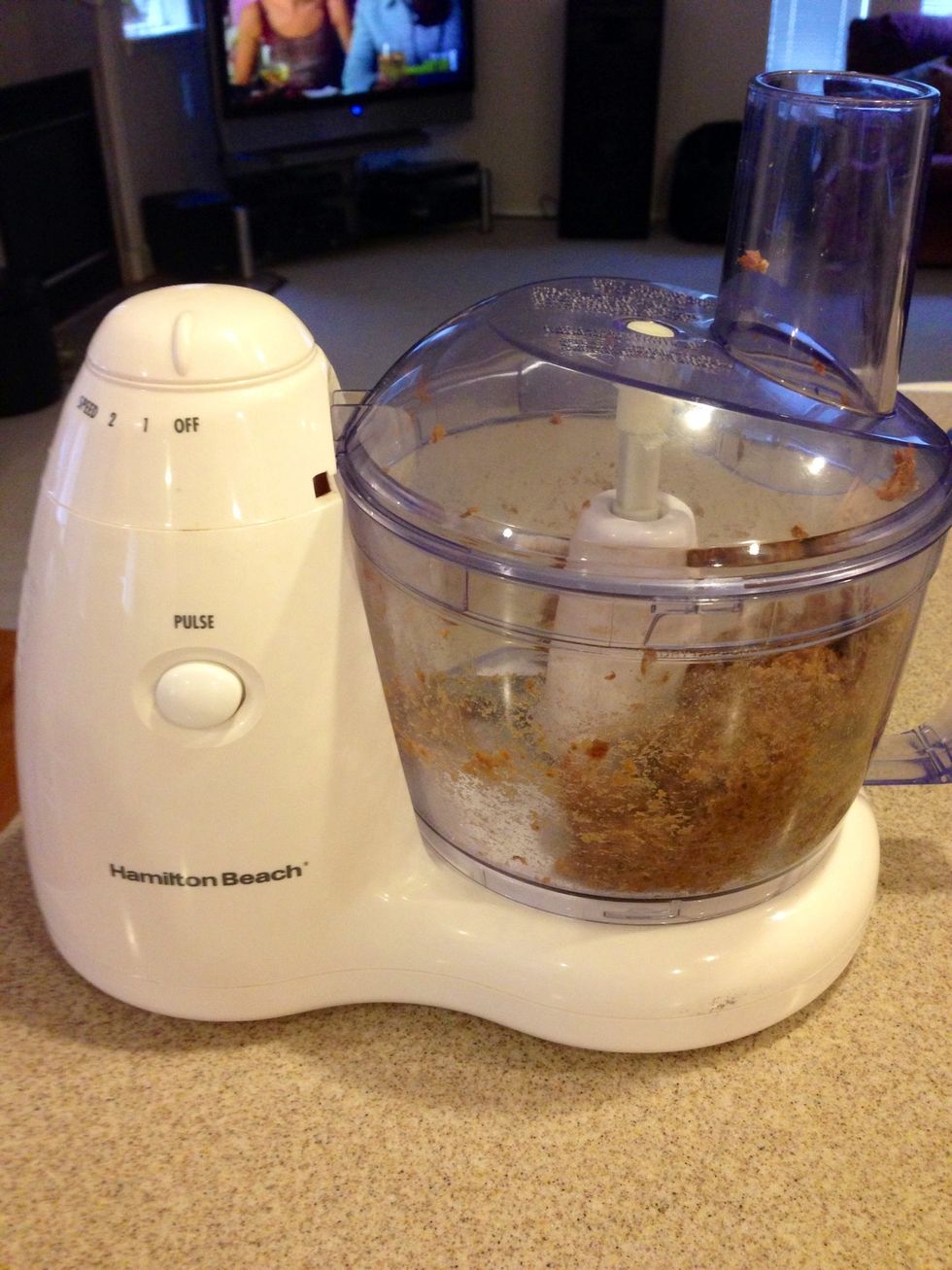 Place your chopped dates in a food processor and blend. Then add 1/3 of your coconut cream and blend again.