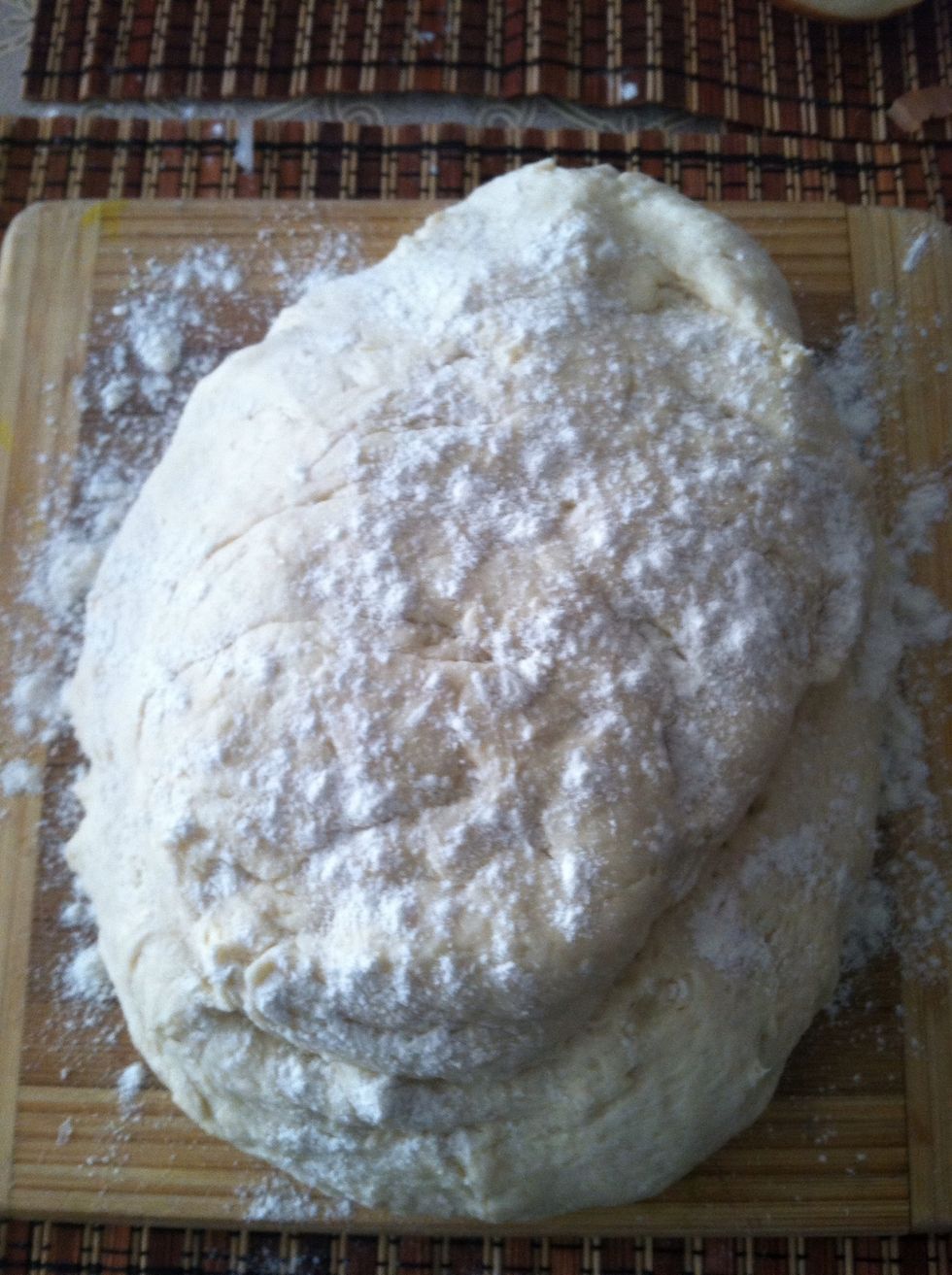 Place your dough on your surface and sprinkle a little more flour on top.