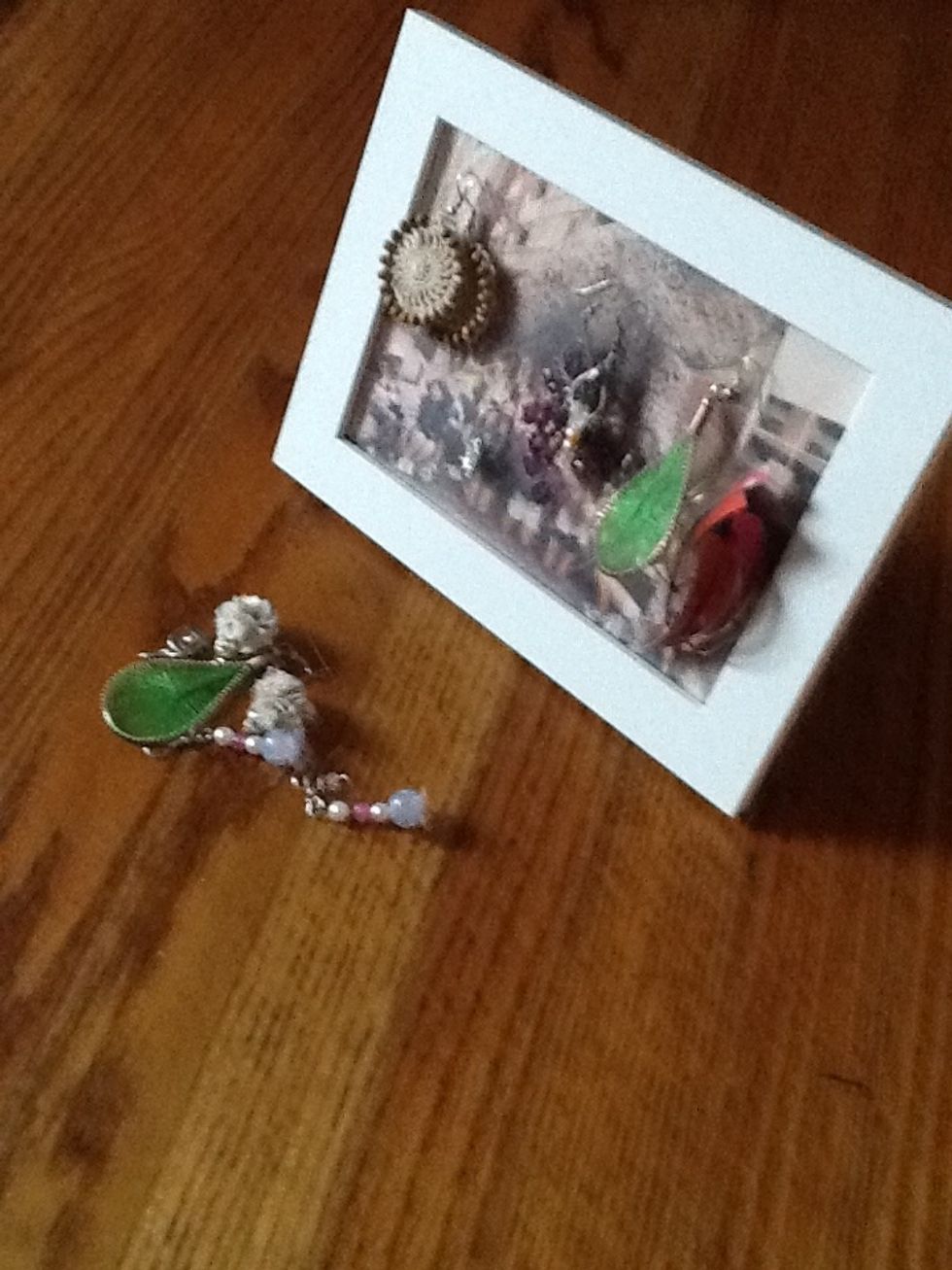 Place your earrings in the holes of the mesh fabric for a beautiful display.