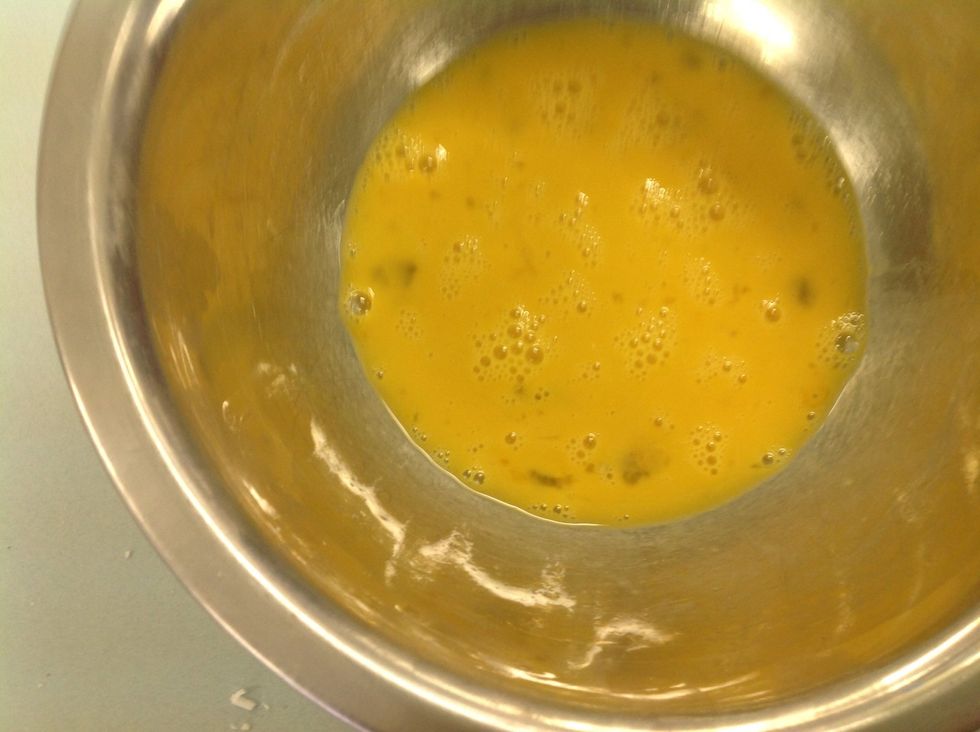 Place your egg in a small bowl and beat with a whisk or fork