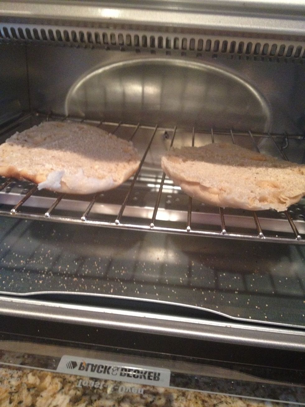 Place your English muffin in the toaster oven until crispy