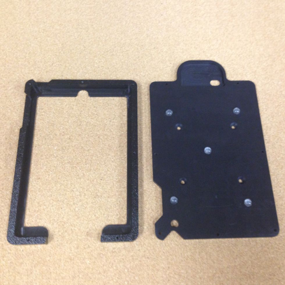 Place your face plate and back plate on a smooth protective surface. Unit ships with 2 screws installed for protection. These should be removed and saved for later use.