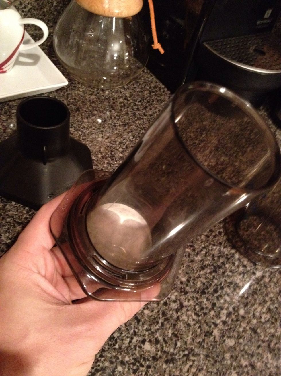 Place your filter in the cap and screw on the chamber.