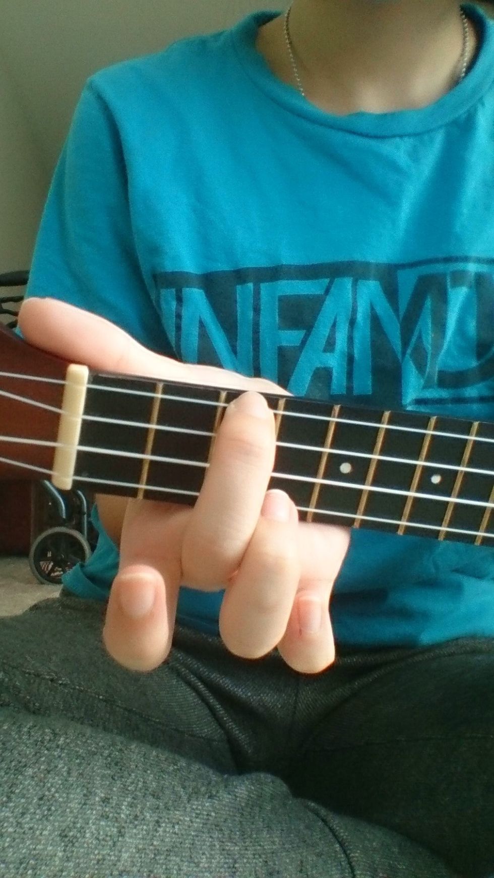 Place your finger on the 3rd fret , A string and pluck once