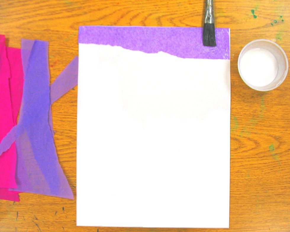 Place your first color of tissue paper horizontally on top of the glue. Make sure all edges are glued thoroughly. If needed, spread glue over the top of the tissue paper to smooth any bubbles.