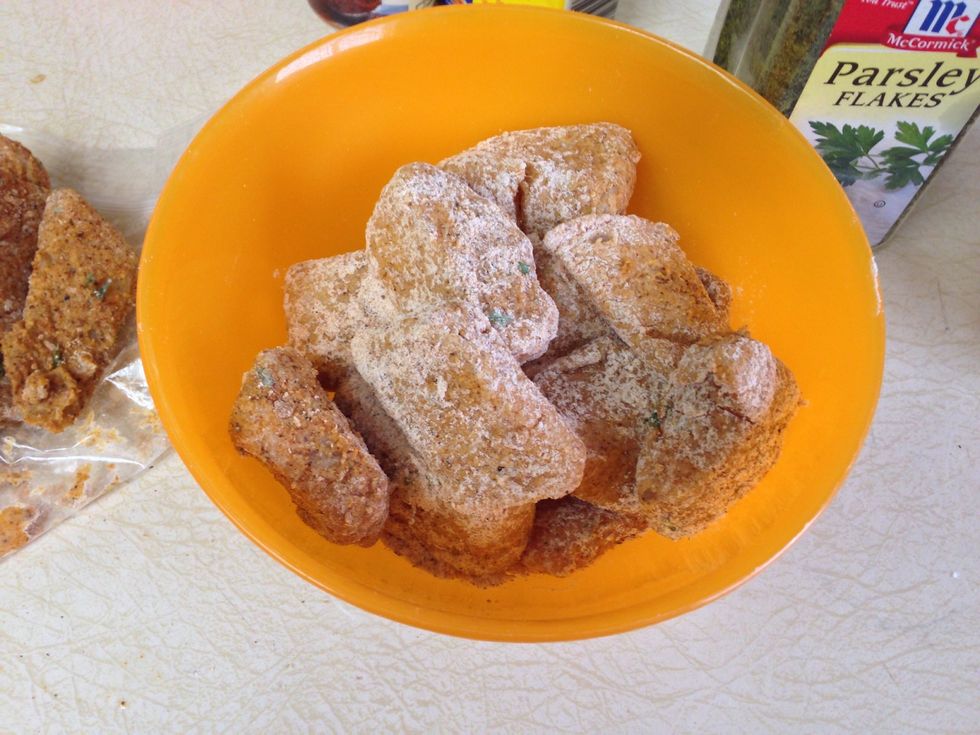 Place your fish in the bag, close it and shake until fish is completely coated. Place in a completely dry bowl. Getting the fish wet may cause your oil to pop when it is frying.