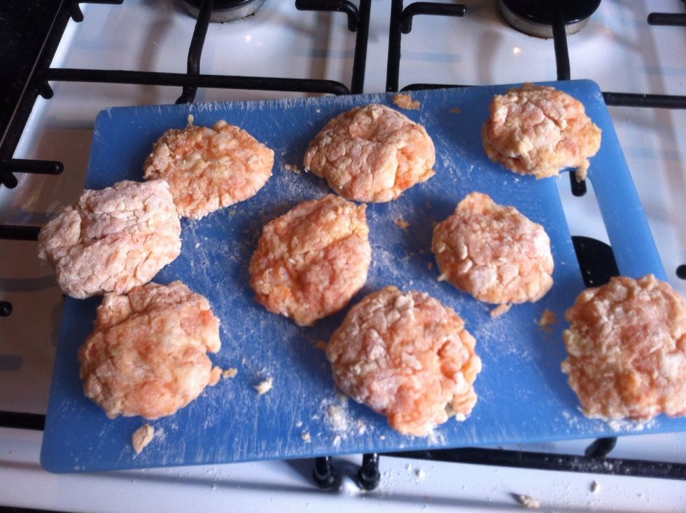 Place your fishcakes on to a flat surface, so you can put these easily into a pan.