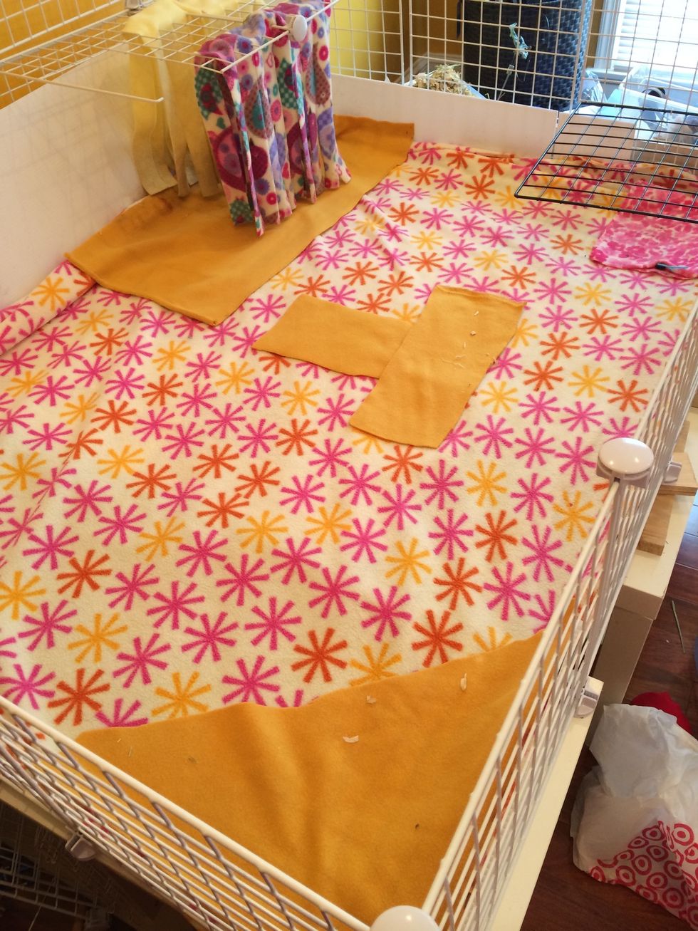 Place your fleece over the towels. Also add an extra fleece piece wherever a shelter is going. (You need to wick fleece before use- wash it 2-3 times until liquid soaks through)