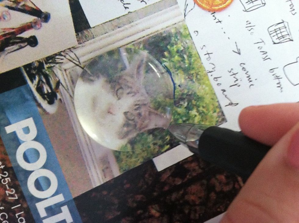 Place your glass marble over an image you like, outline it with your pen and then cut out the image.