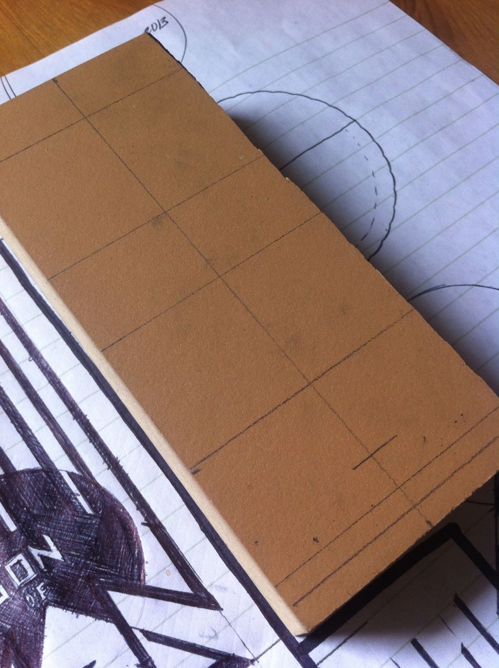 place your linoleum block next to your design, or over it if it's cut to size. Draw skeleton lines where your intersection marks are.