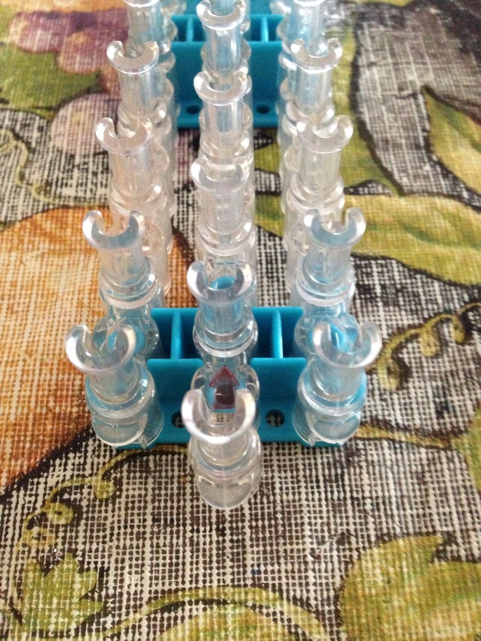 Place your loom with the arrow pointing away from you