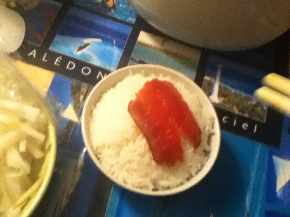 Place your meat on the bowl of rice or plate