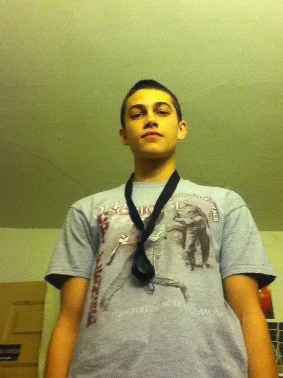 Place your neck strap around your neck with the hook on the front side of your body.