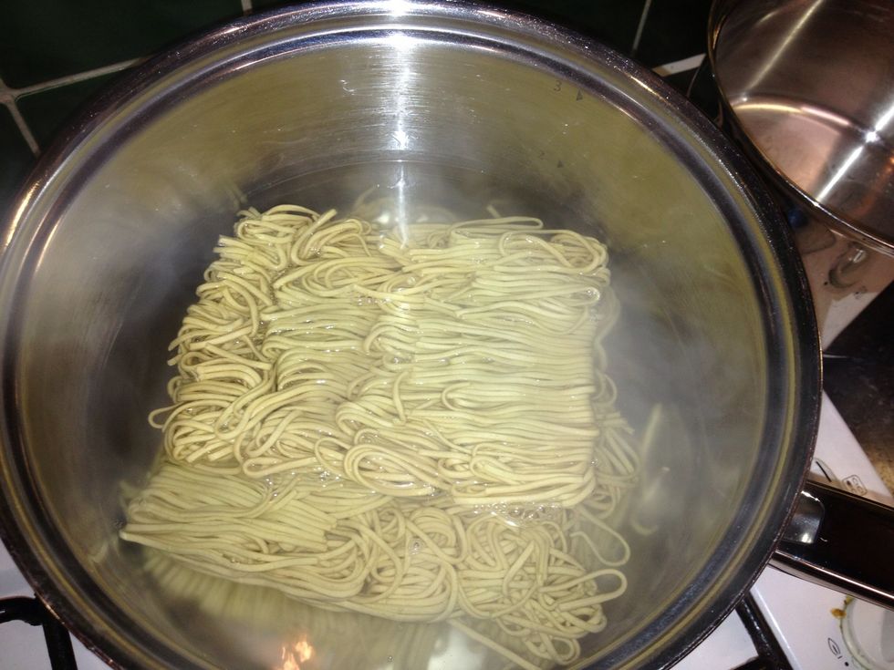 Place your noodles into boiling water this is for three people so I did three packets.