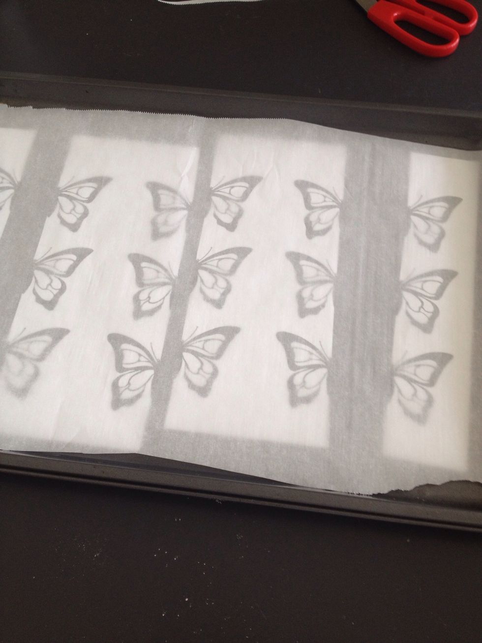Place your parchment paper on top of your cutouts.